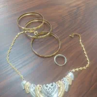 ۵۶ الی ۵۷ گرم طلا