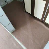موکت کارکرده رنگ کرم قهوه‌ای