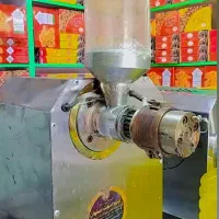 روغن گیری رایگان از کنجد فروشگاه قهرمان