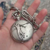 یسری سکه و ساعت قدیمی
