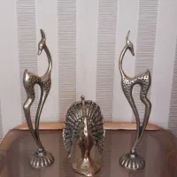 طاووس و زرافه