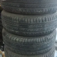 لاستیک بارز همراه با رینگ 15زیر صفری