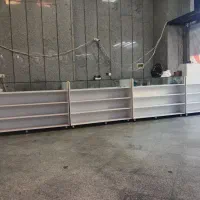لوازم مغازه میز دخل کانتر ویترین استند تابلو روان