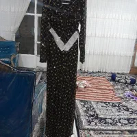 یک عدد لباس مجلسی و یک عدد مانتو مجلسی