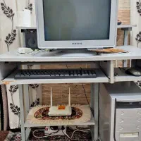 یک عدد کامپیوتر و کمد بچه