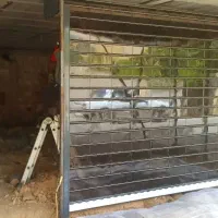 تعمیرات و نصب کرکره و  درب برقی (منصف)