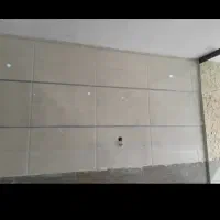 نصاب نصب کاشی و سرامیک بین کابینت