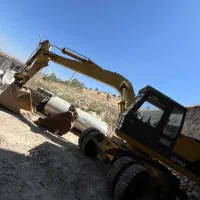بیل مکانیکی چرخ لاستیکی هپکو اچ 100