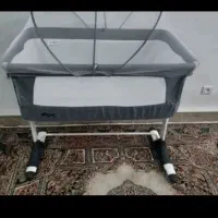 گهواره وتخت کنار مادر