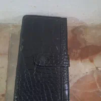 کیف زنانه همراه باشناسنامه وگواهی نامه و...پیداشده