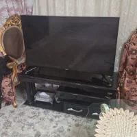 تلویزیون سامسونگ ۴۸ اینچ و میز تلویزیون دو کشو
