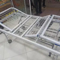 تخت بستری دو شکن