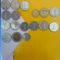 ۲۳ سکه درهم امارات و بات تایلند و ریال ایران