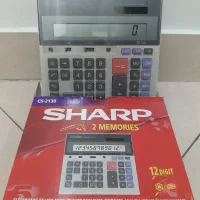 ماشین حساب مهندسی شارپ(CS-2130)و دستگاه منگنه( MAX