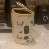 شیشه شیر گرم کن نوزاد نو نو