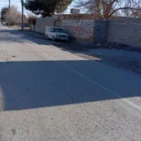 زمین400متری دوکله ازسه طرف راه نزدیک اتوبان اصلی