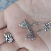 دو عدد گوشواره و یک دستبند نقره