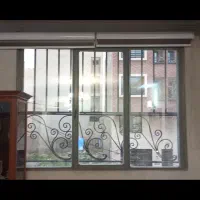 پنجره فلزی با شیشه رفلکس برنز