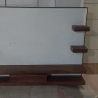 زیر تلویزیون  دیواری   درحد نو
