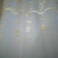 پرده با چوبش