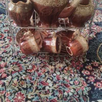 سرویس قهوه خوری و نیم لیوان