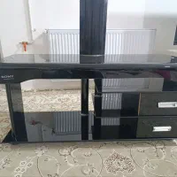 زیرتلویزیون شیشه ای