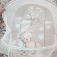 سرویس تخت روروئک تشک پشه بند و اغوشی کودک