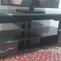 زیر تلویزیونی شیشه ای