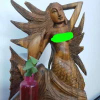 مجسمه چوبی کار دست