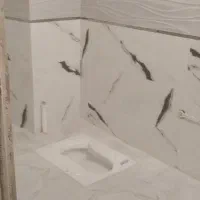 کاشی وسرامیک کاری سنگ وموزائیک کاری بین کابینتی نم