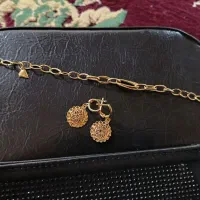 فروش فوری دستبند وگوشوار طلا ۳ درصد