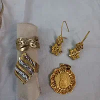 طلا روس انگشتر. پلاک. گوشواره
