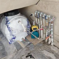 تاسیسات،نصب پمپ تانک، آبگرمکن،لوله‌کشی آب