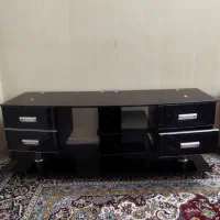 میز تلویزیون شیشیه ای تمیز