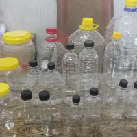 بطری و جار عسل و جای ادویه