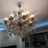 یک عدد لوستر برنجی نو 20 شاخه و2 عدد دیوار کوب