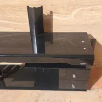 میز تلویزیون شیشه ای دوکشودا نو سالم فرش دستباف