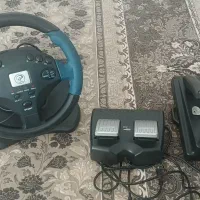 پلی ۲ همراه با فرمان و پدال بازی