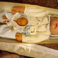 عروسک و بچه قذیمی