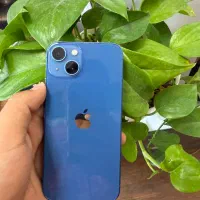 iPhone 13 رنگ آبی باتری ۱۰۰ درصد بدون نقطه پلمپ