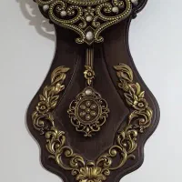 ساعت دیواری آونگ دار
