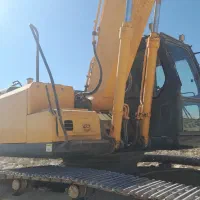 راننده بیل مکانیکی زنجیری میخام