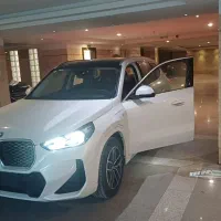 بی ام و  ix1 با کیت M برقی 2025 سفید فول کامل