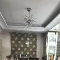 پرده زبرا قهوه ای با گلهای طلایی