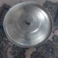 یک عدد قابلمه نونو وتمیز روحی پشت تفلن