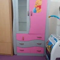 کمد کودک و پشتی چوبی و بوفه