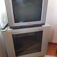 تلویزیون الجی ۲۱ با میز و کنترل