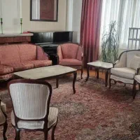 مبل استیل ۷ نفره همراه با میز ناهارخوری ۸ نفره