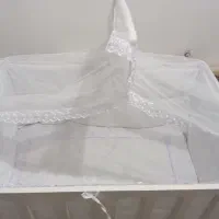 تخت کنار مادر و گهواره