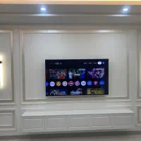 نصب تخصصی تلویزیون روی دیوار و روی میز